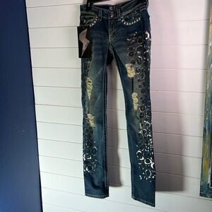 Stylish Blue Distressed Jeans with Silver Accents